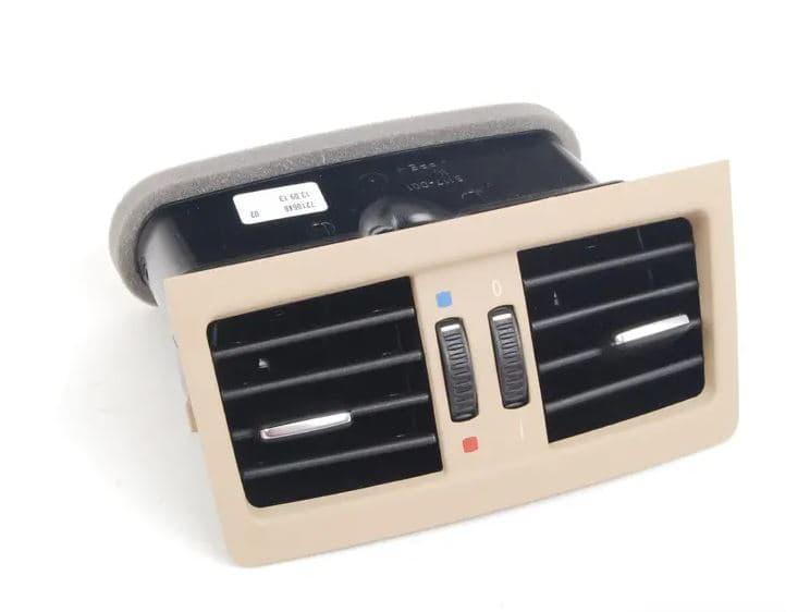 TT-1729813313146160857_A Original BMW E90 Cover Kisi Kisi AC Belakang Konsol Tengah Beige - Gambar 1
